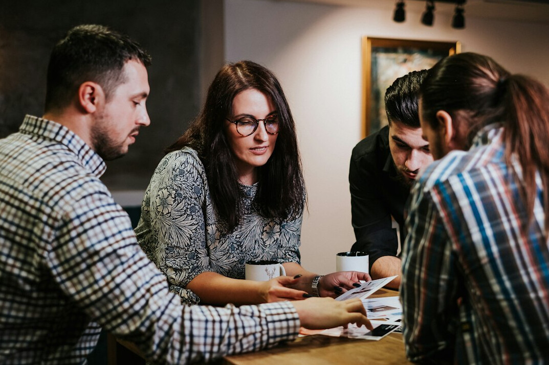 corporate team discussing software